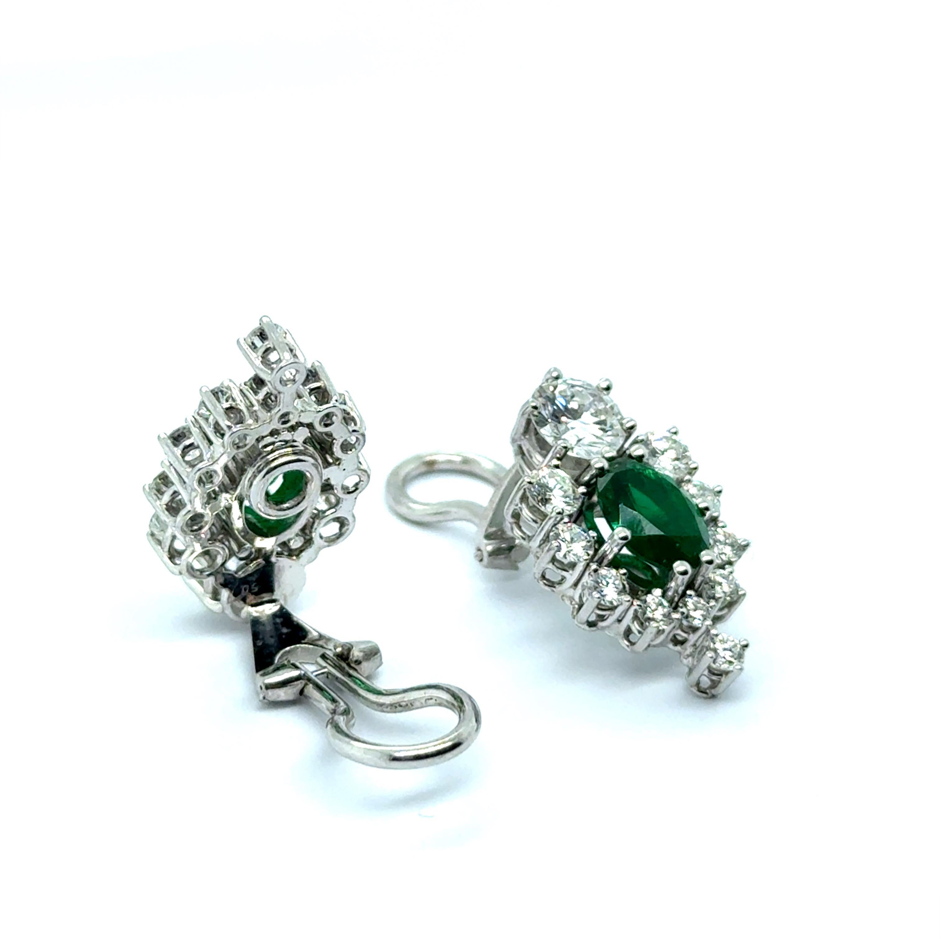 Oval Cut Earrings with Emeralds & Diamonds in 18 Karat White Gold For Sale