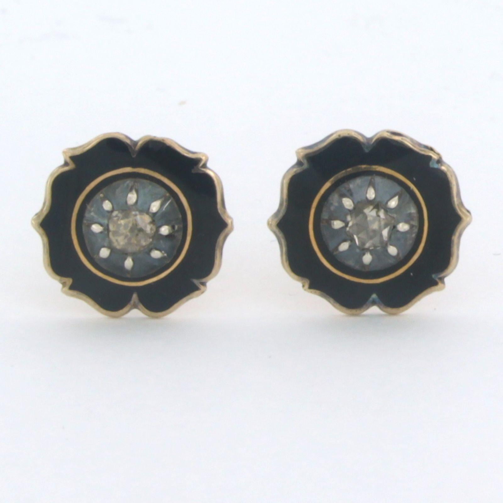 14k yellow gold stud earrings with and on silver set rose diamond up to 0.10ct - G/H - SI - decorated with black enamel 

detailed description

the front of the stud is 1.2 cm wide

total weight: 2.7 grams

set with:

- 2 x 3.0 mm rose cut diamond