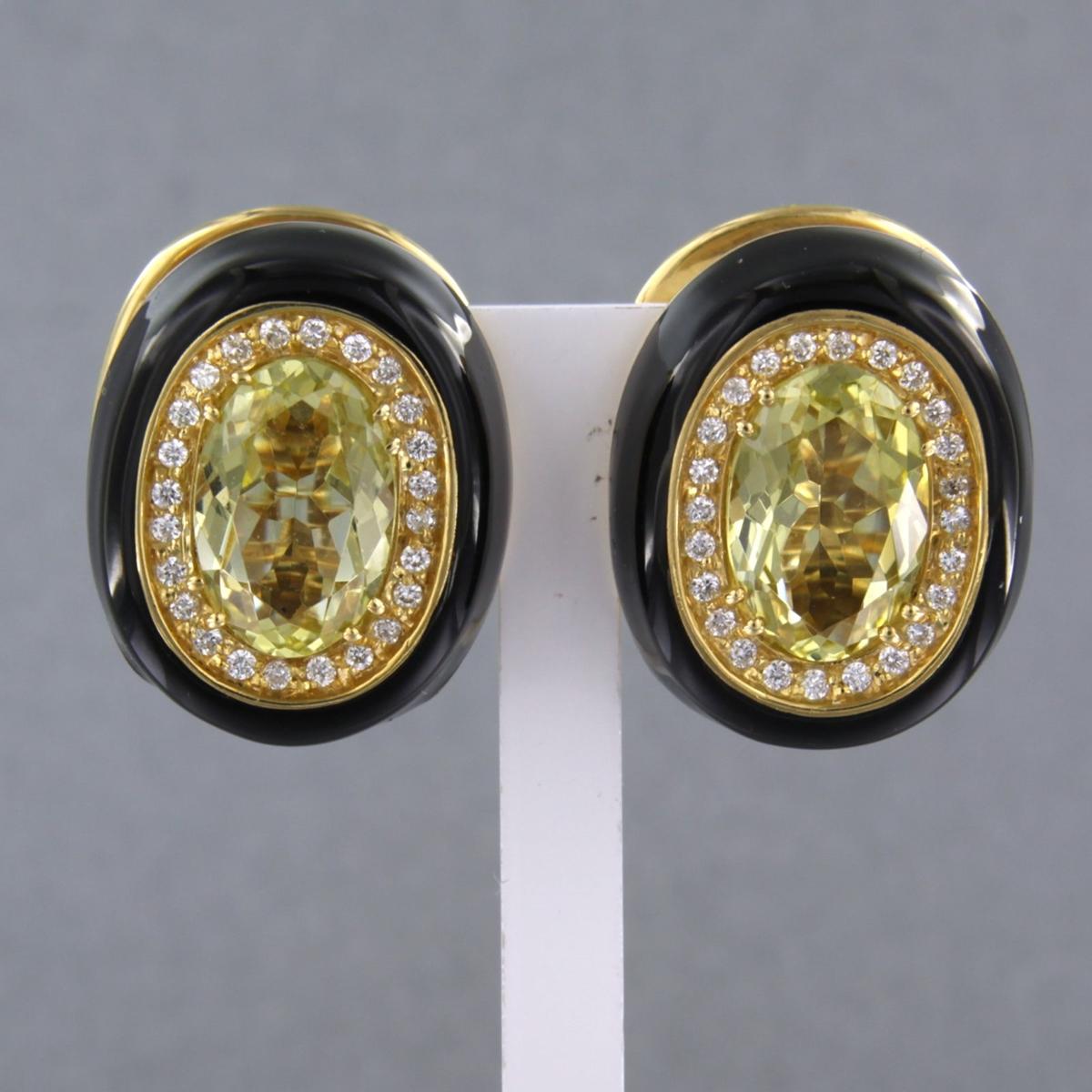 18k yellow gold ear clips set with citrine and brilliant cut diamonds. 0.60ct - F/G - VS/SI

detailed description:

the size of the ear clip is 2.1 cm long by 1.7 cm wide

weight 25.8 grams

occupied with

- 2 x 1.2 cm x 8.0 mm oval facet cut