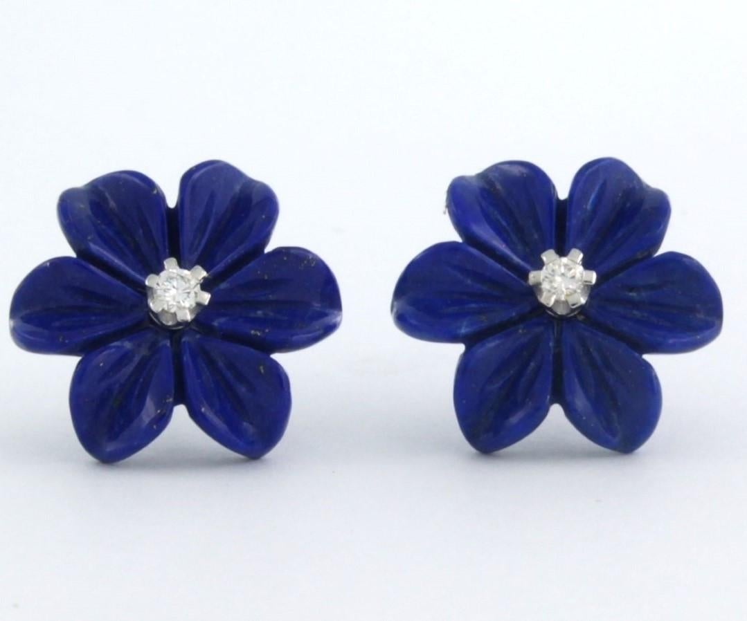 Boucles d'oreilles en or blanc 18k avec lapis-lazuli et diamant taille brillant 0.08 ct - F/G - VS/SI

Description détaillée :

Les clous d'oreilles ont un diamètre de 1,4 cm.

Poids total 3,0 grammes

set avec

- 2 x 1,4 cm lapis-lazuli taillé en