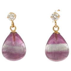 Orecchini con diamanti fluoriti e taglio brillante fino a 0,28ct in oro 18k 6,6 grammi