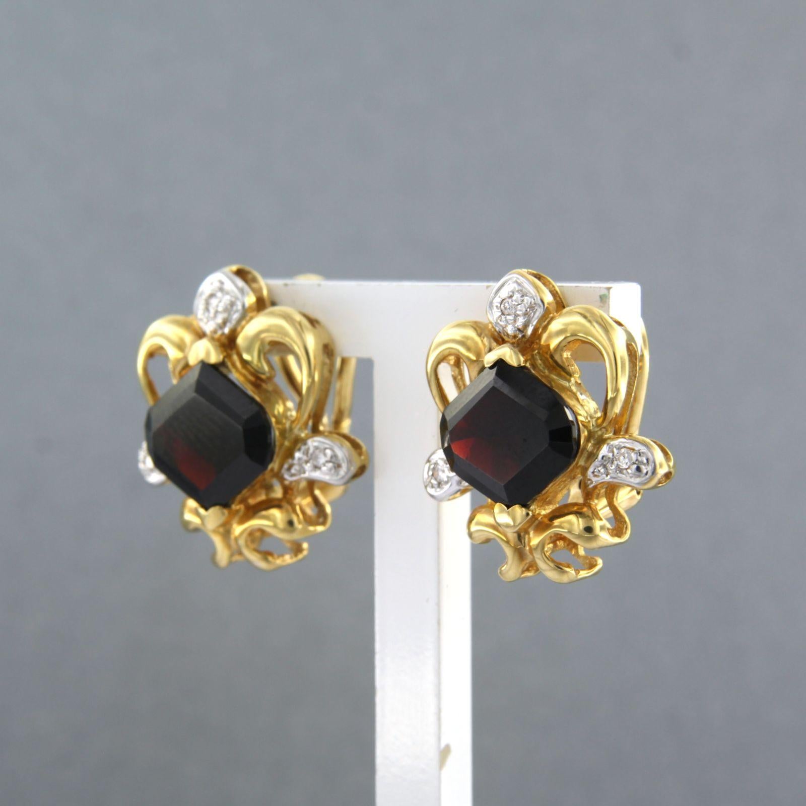 Modern Earrings with garnet and brilliant cut diamonds up to 0.06ct 8.9 grams 18k gold For Sale