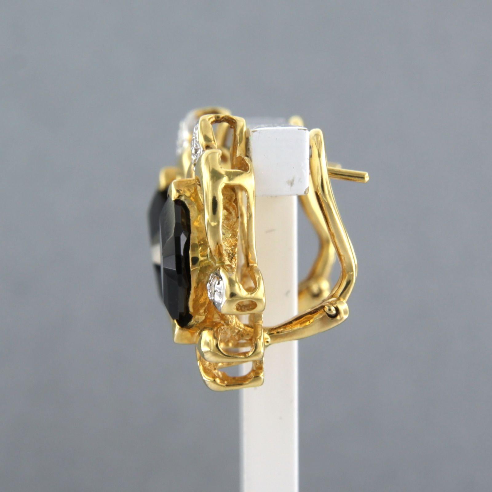 Earrings with garnet and brilliant cut diamonds up to 0.06ct 8.9 grams 18k gold In Excellent Condition For Sale In The Hague, ZH
