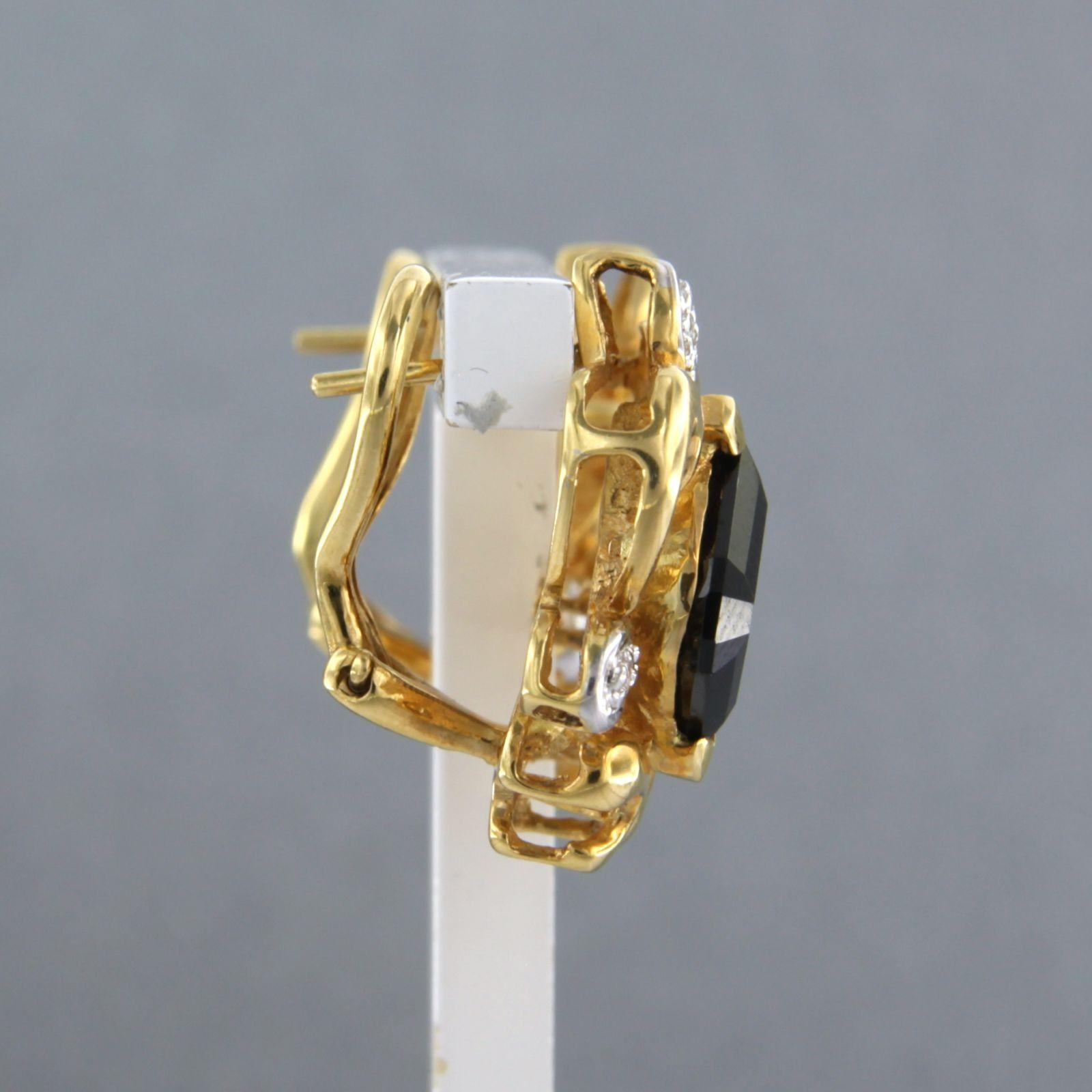 Women's Earrings with garnet and brilliant cut diamonds up to 0.06ct 8.9 grams 18k gold For Sale