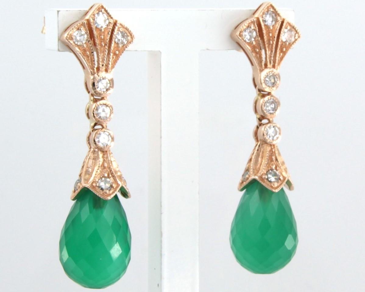 14k pink gold earrings set with chalcedony and single cut diamonds. 0.45ct - G/H - VS/SI 

detailed description

The dimensions of the earrings are 2.7 cm high and 8.3 mm wide

weight: 6.0 grams

occupied with :

- 2 x 9.0 mm x 7.0 mm drop facet cut