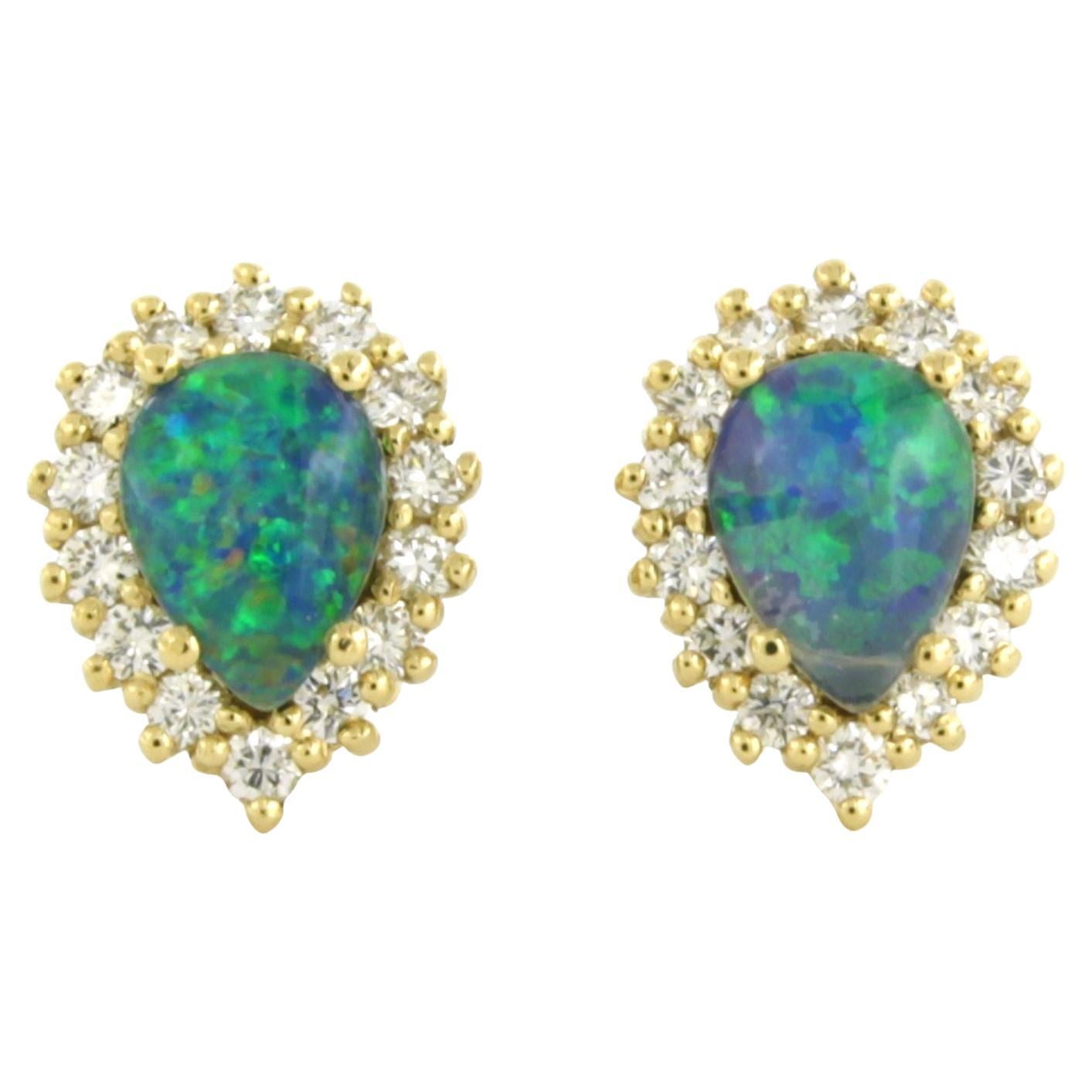 Pendientes con ópalo y diamantes talla brillante hasta 0,52ct Oro amarillo de 18k