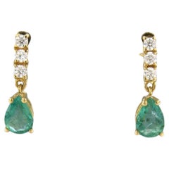 Earrings with pear shape emerald and brilliant cut diamonds 18k yellow gold