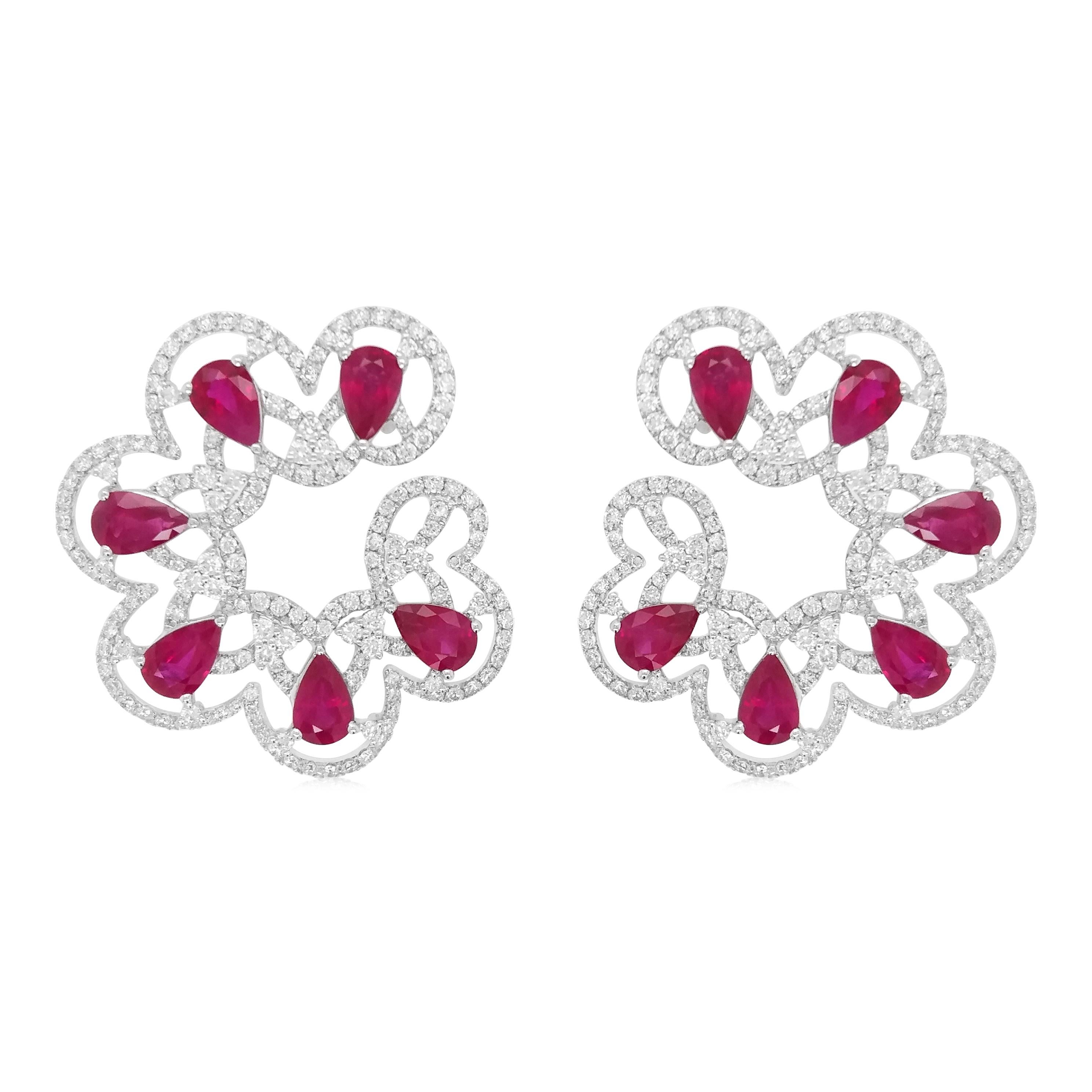 Elegant Earrings featuring pear-shaped natural rubies and sparkling white diamonds, crafted in luxurious 18K white gold. A perfect blend of vibrant color and timeless brilliance, these hoop-style earrings add a touch of sophistication to any