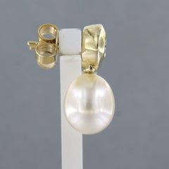 Orecchini con perla e diamante taglio brillante sup a 0,30ct in oro 14k 6,6 grammi