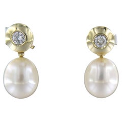Orecchini con perla e diamante taglio brillante sup a 0,30ct in oro 14k 6,6 grammi