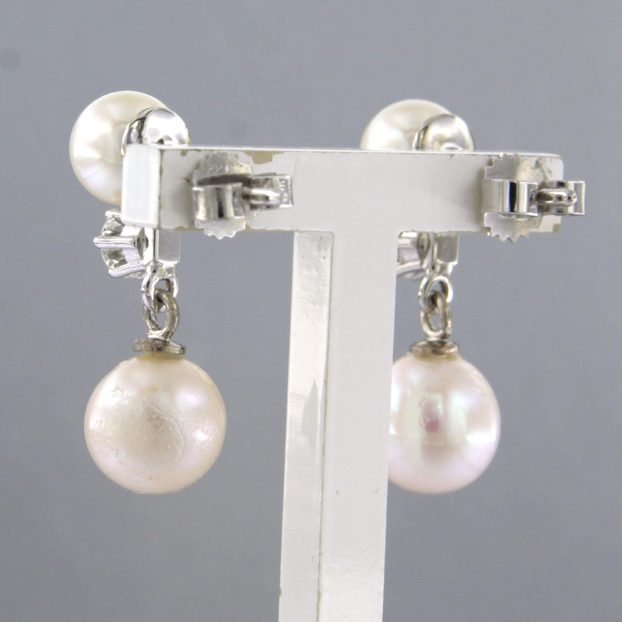 Pendientes con perla y diamantes talla brillante hasta 0,50ct Oro de 14k 4,8 gramos en Excelente estado para la venta en The Hague, ZH