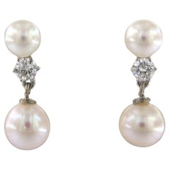 Orecchini con perla e diamanti taglio brillante fino a 0,50ct in oro 14k 4,8 grammi