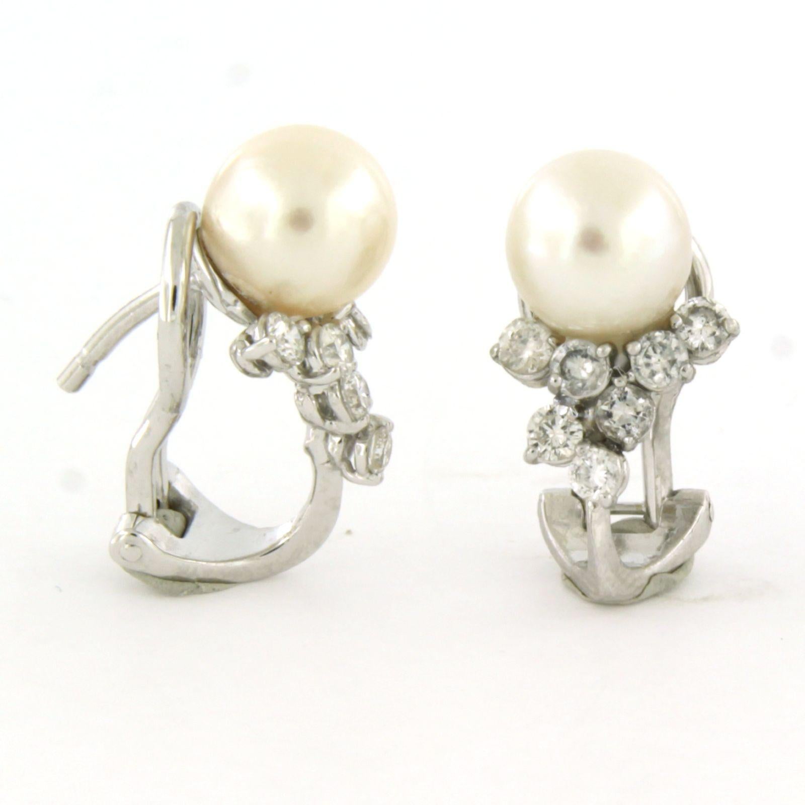 Pendientes con perla y diamantes talla brillante hasta 0,50ct Oro de 18k 5,1 gramos en Excelente estado para la venta en The Hague, ZH