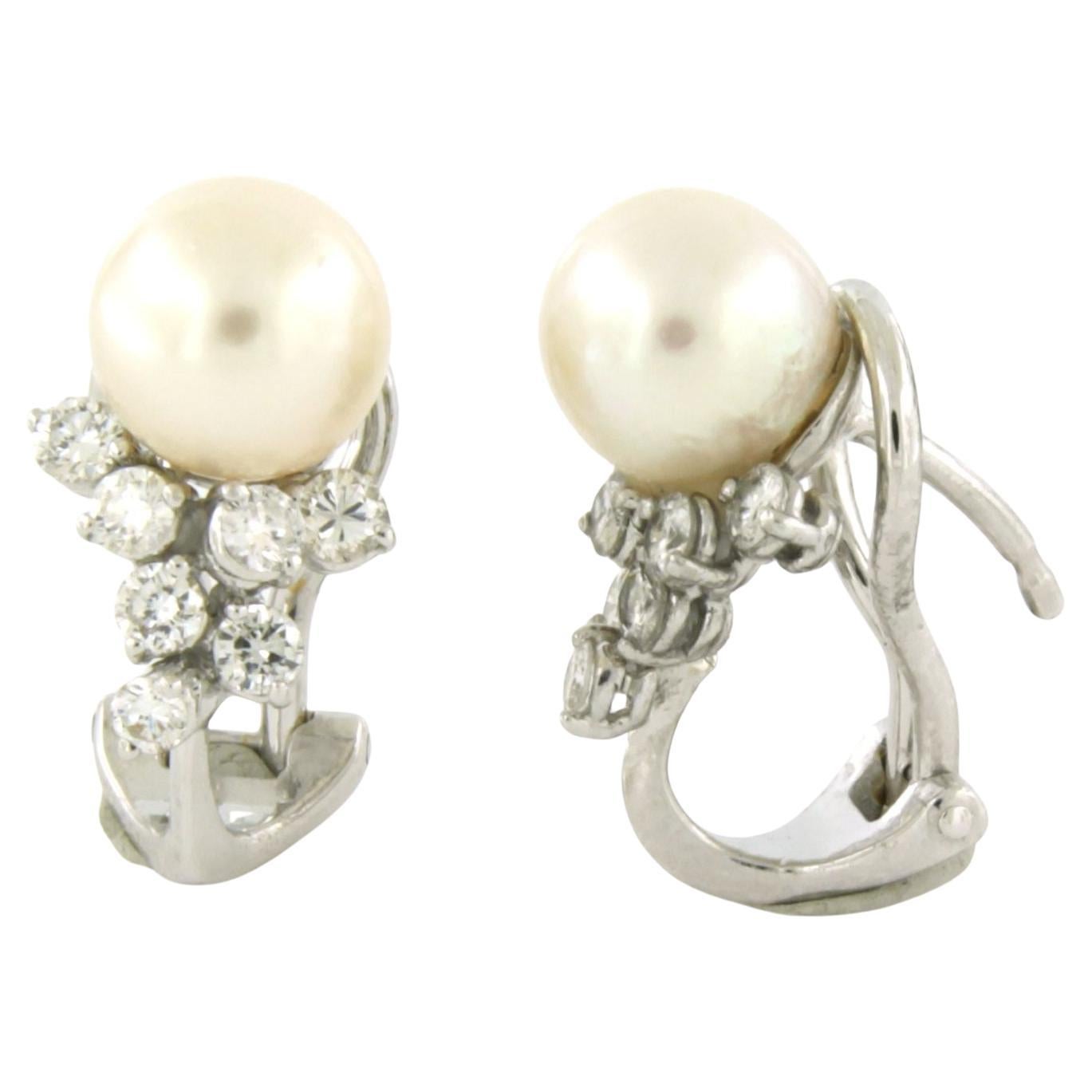 Orecchini con perla e diamanti taglio brillante fino a 0,50ct in oro 18k 5,1 grammi