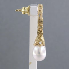 Earrings with pearl and single cut diamonds up to 0.32ct 14k yellow gold