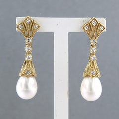 Earrings with pearl and single cut diamonds up to 0.32ct 14k yellow gold