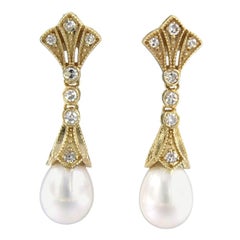 Earrings with pearl and single cut diamonds up to 0.32ct 14k yellow gold