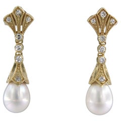 Earrings with pearl and single cut diamonds up to 0.36ct 14k yellow gold