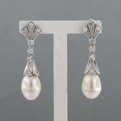 Earrings with pearl ans single cut diamonds up to 0.30ct 14k gold 4.3 grams