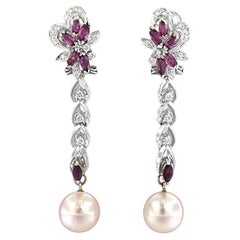 Earrings with pearl, ruby and brilliant cut diamonds up to 0.30ct 14k gold