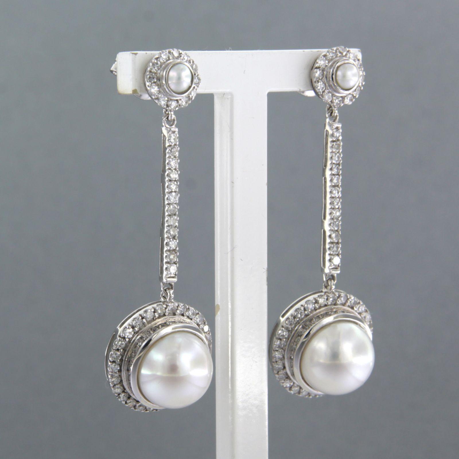 Moderne Boucles d'oreilles en or blanc 14 carats avec perles et diamants taille unique jusqu'à 0,82 carat en vente
