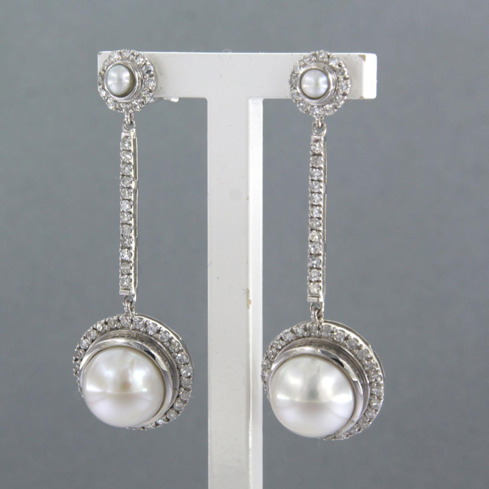 Taille simple Boucles d'oreilles en or blanc 14 carats avec perles et diamants taille unique jusqu'à 0,82 carat en vente