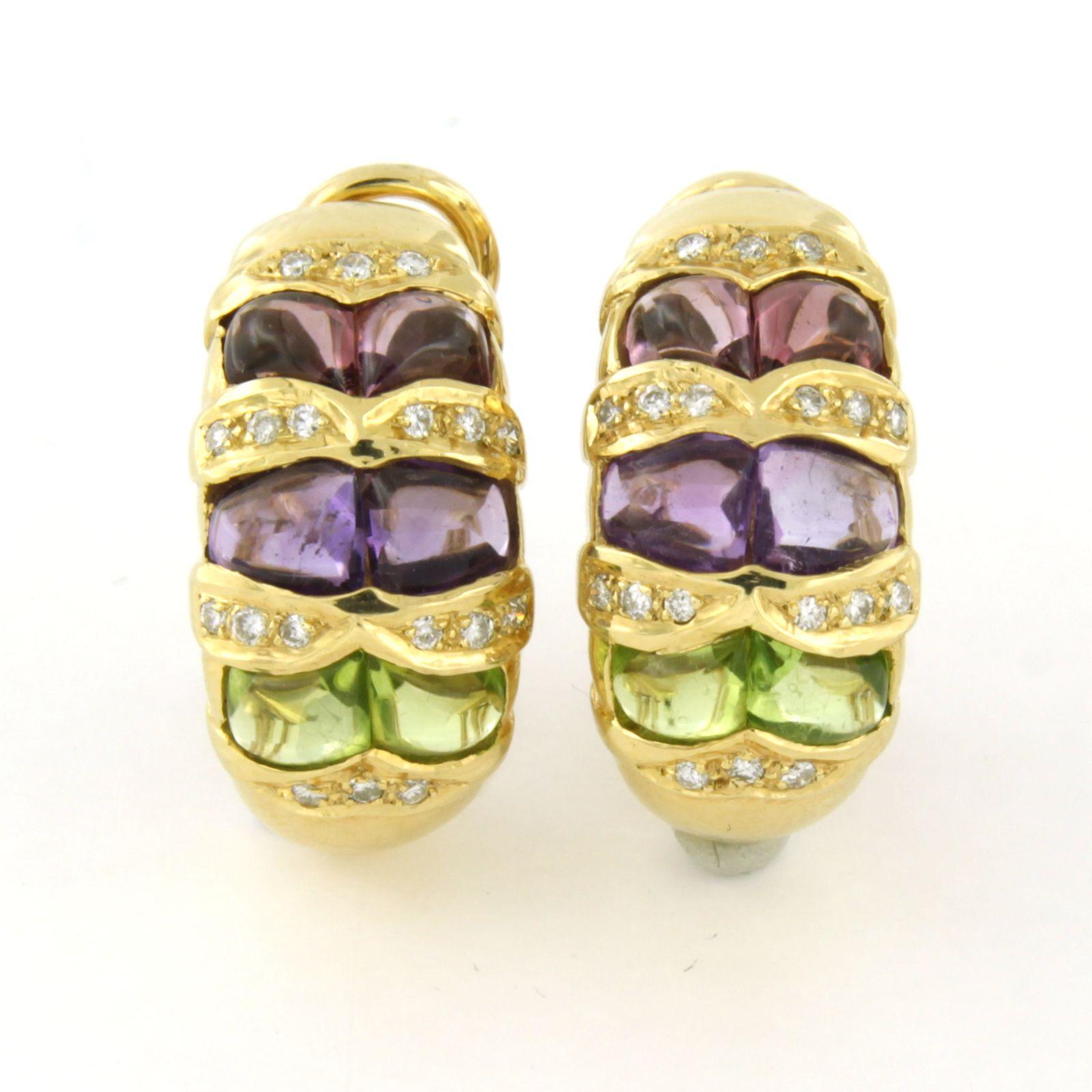 Boucles d'oreilles clip en or jaune 14k serties d'améthyste, péridot et diamant taille brillant jusqu'à 0.20ct - F/G - VS/SI

Description détaillée :

Les boucles d'oreilles à clip mesurent 2,0 cm de long et 1,0 cm de large.

Poids total 10,7