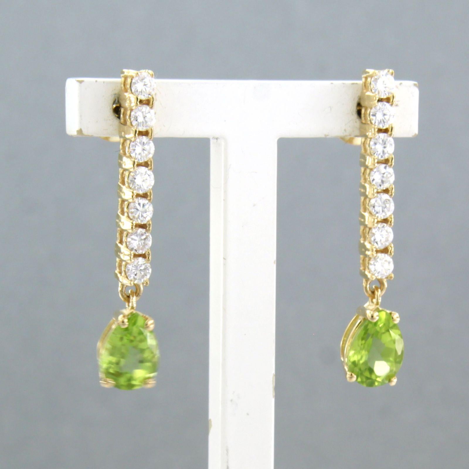 Earrings with peridot and brilliant cut diamonds up to 0.58ct 18k yellow gold For Sale 1