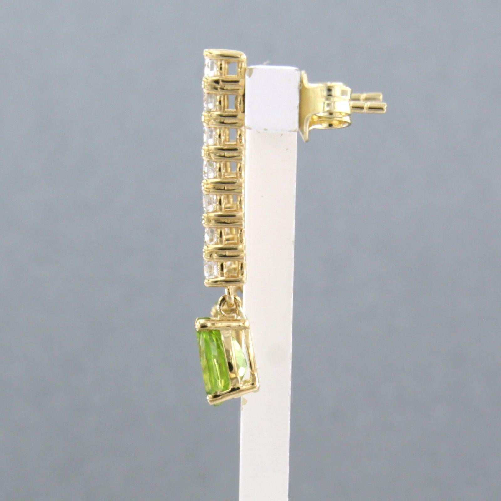 Pendientes con peridoto y diamantes talla brillante hasta 0,58ct Oro amarillo de 18k en venta 1