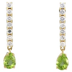 Pendientes con peridoto y diamantes talla brillante hasta 0,58ct Oro amarillo de 18k