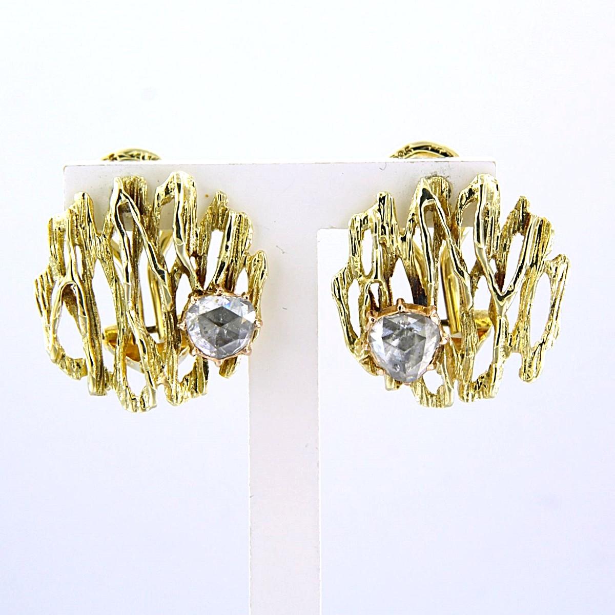 Boucles d'oreilles clips en or bicolore 14k serties de diamants taille rose jusqu'à 0,50 ct - F/G - VS/SI

Description détaillée :

La partie supérieure des boucles d'oreilles à clip a un diamètre de 1,8 cm.

Poids : 5,2 grammes

Set avec :

- 2