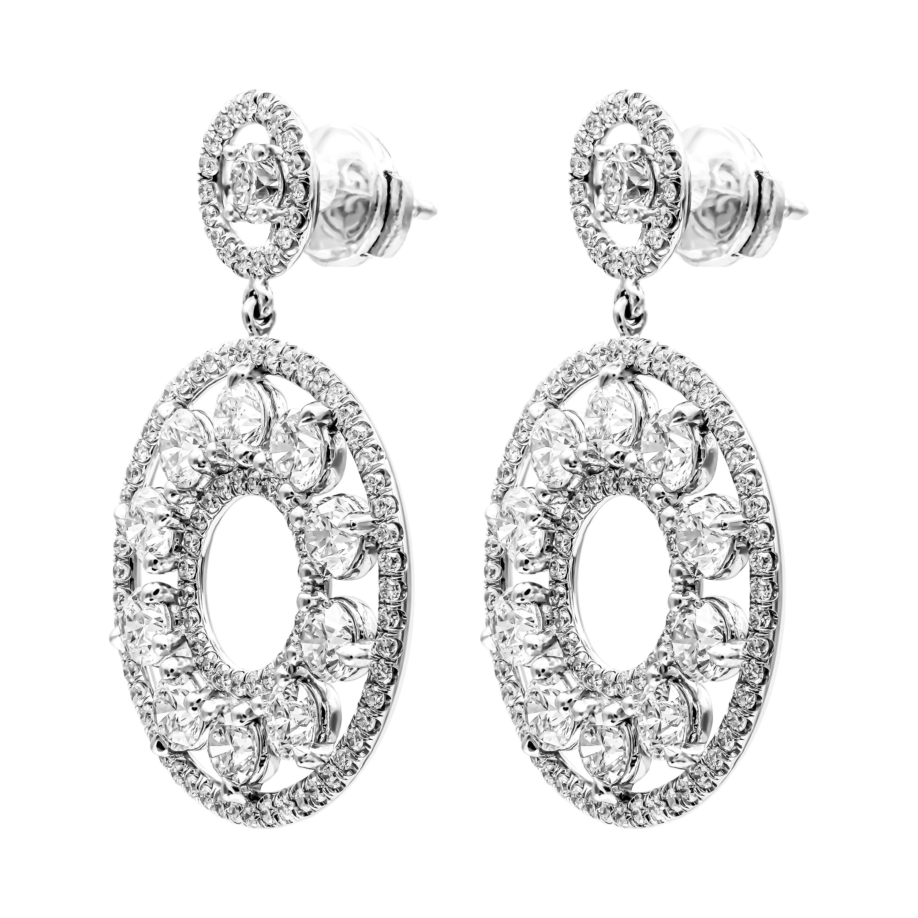 Unique and Elegant, one of a kind custom made Earrings that you won't see anywhere else!
Earring featuring 20 large full cut round brilliants on the bottom pave wire, and 2 on the top one, F-G color, VS clarity, totaling 5.12ct (both earrings), 4mm