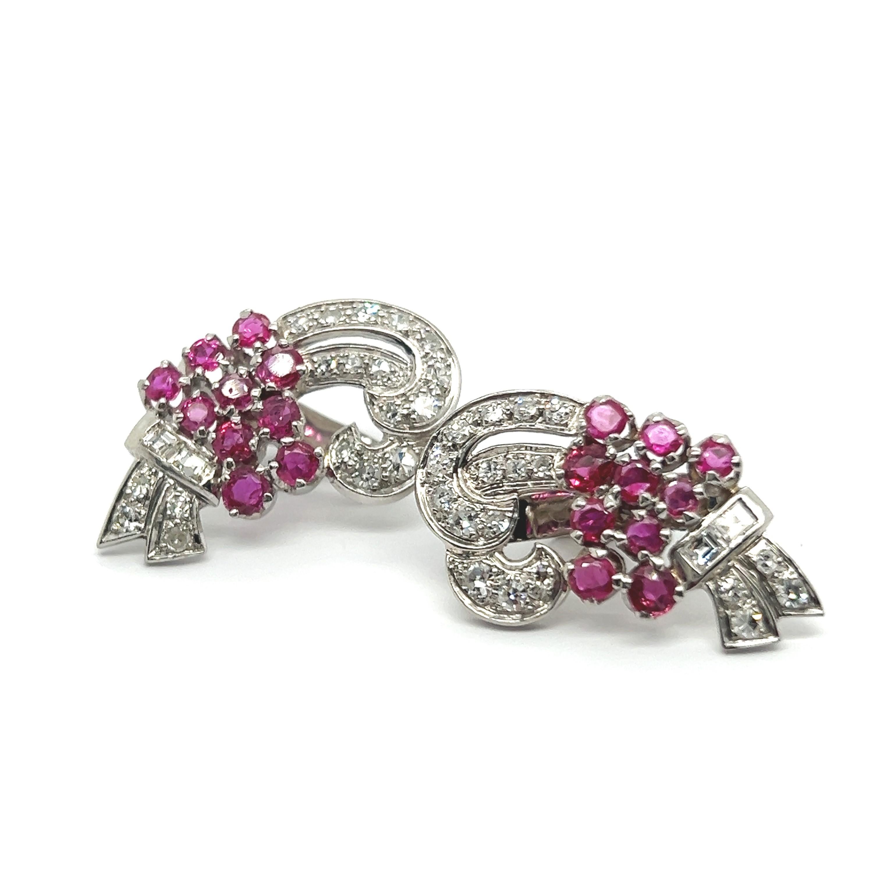 These elegant platinum earrings are inspired by the natural beauty of a flower branch in bloom. Featuring 20 vivid rubies, their rich red hues resemble delicate petals, while 36 diamonds of diverse cuts add brilliance and depth. The flowing design