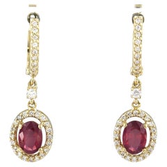 Earrings with ruby up to 1.70ct and brilliant cut diamonds up to 0.42ct 14k gold