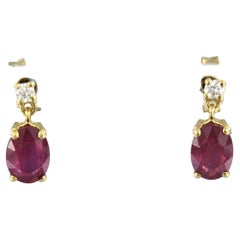 Earrings with ruby up to 2.20ct and brilliant cut diamonds up to 0.08ct 18k gold