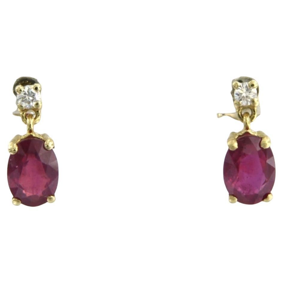 Boucles d'oreilles avec rubis jusqu'à 2,20ct et diamants taille brillant jusqu'à 0,08ct Or 18k en vente