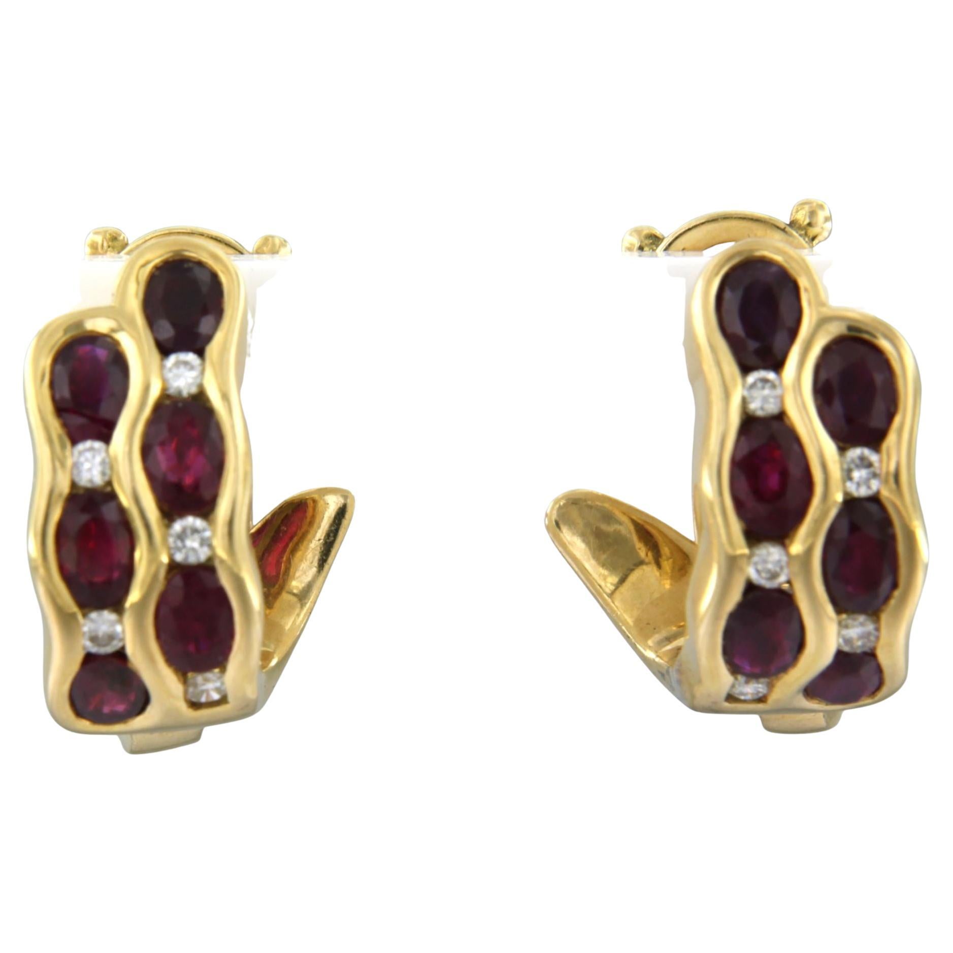 Orecchini con rubino fino a 2,28ct e diamanti taglio brillante fino a 0,25ct in oro 18k