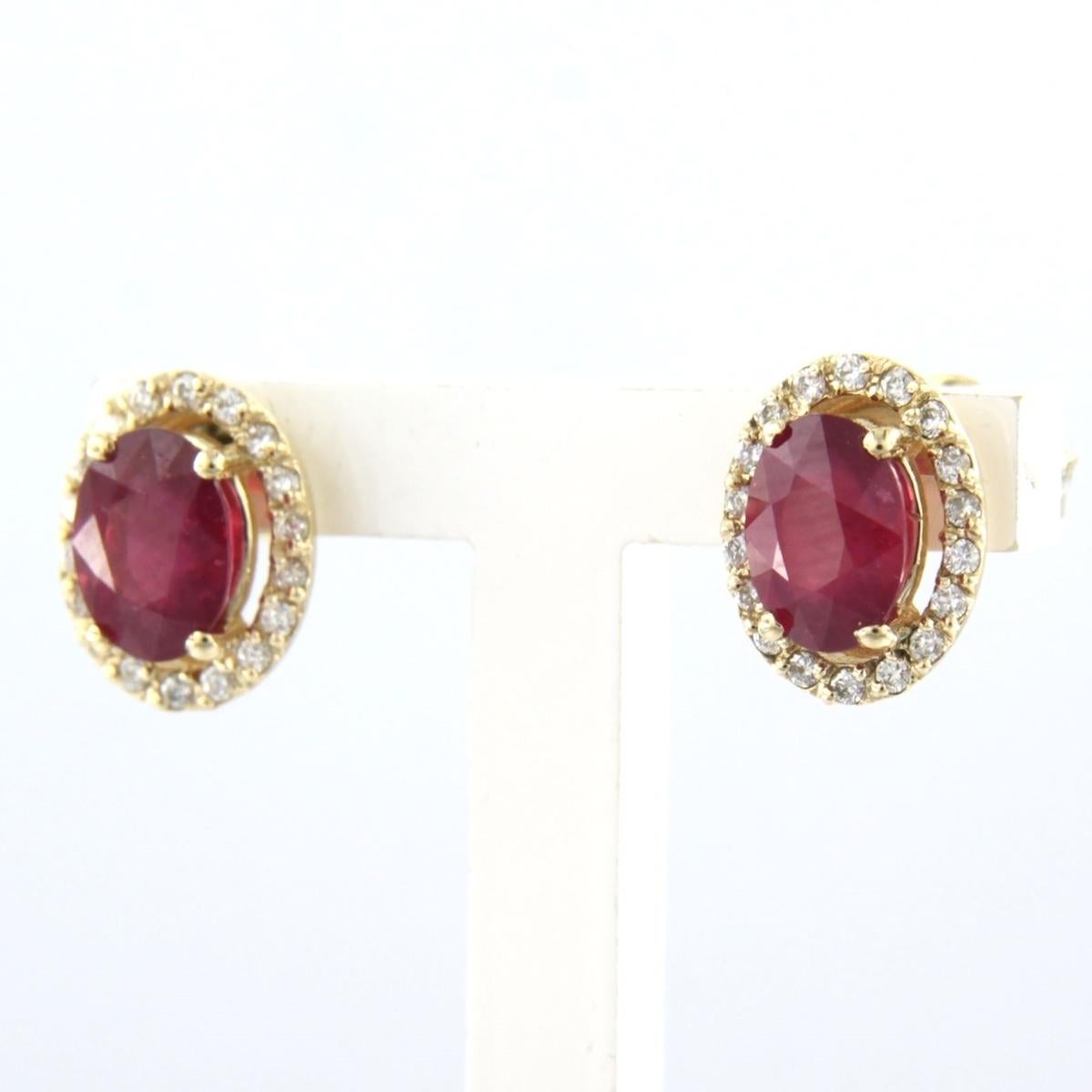 Earrings with ruby up to 2.40ct and brilliant cut diamonds up to 0.20ct 14k gold in vendita 1