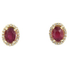 Earrings with ruby up to 2.40ct and brilliant cut diamonds up to 0.20ct 14k gold