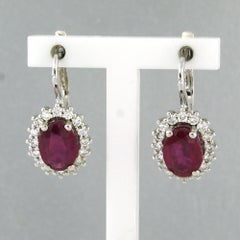 Earrings with ruby up to 3.10ct and brilliant cut diamonds up to 0.58ct 18k gold