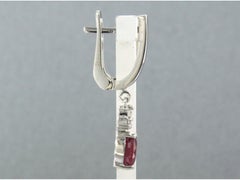 Boucles d'oreilles avec rubis jusqu'à .46ct et diamants taille brillant jusqu'à 0.24ct or 14k