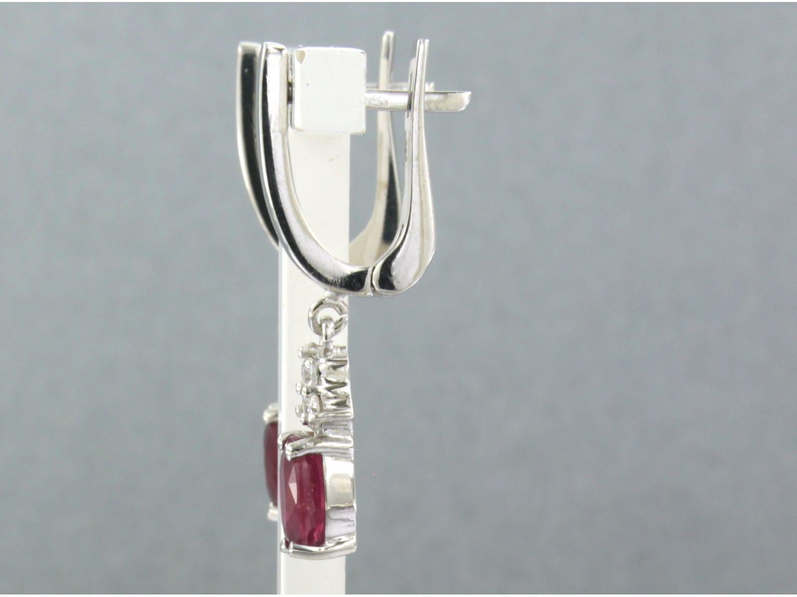 Pendientes con rubí de hasta 0,46 ct y diamantes talla brillante de hasta 0,24 ct Oro de 14k en Nuevo estado para la venta en The Hague, ZH