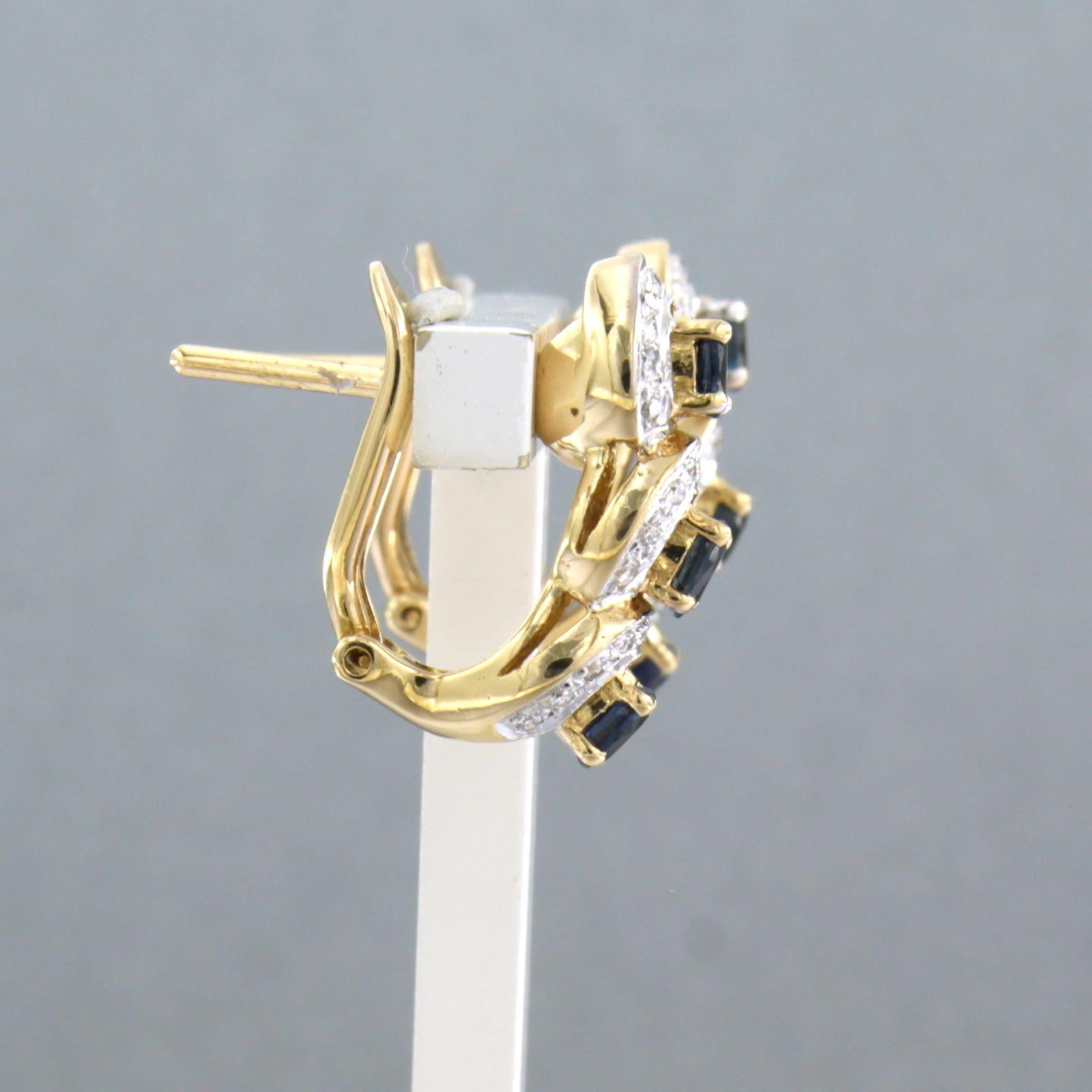 Boucles d'oreilles à clip en or bicolore 18k serties de saphirs et de diamants taille unique jusqu'à environ 0,25 ct - F/G - VS/SI

Description détaillée :

Les boucles d'oreilles mesurent 1,8 cm de haut et 7,7 mm de large.

Poids total : 6,7