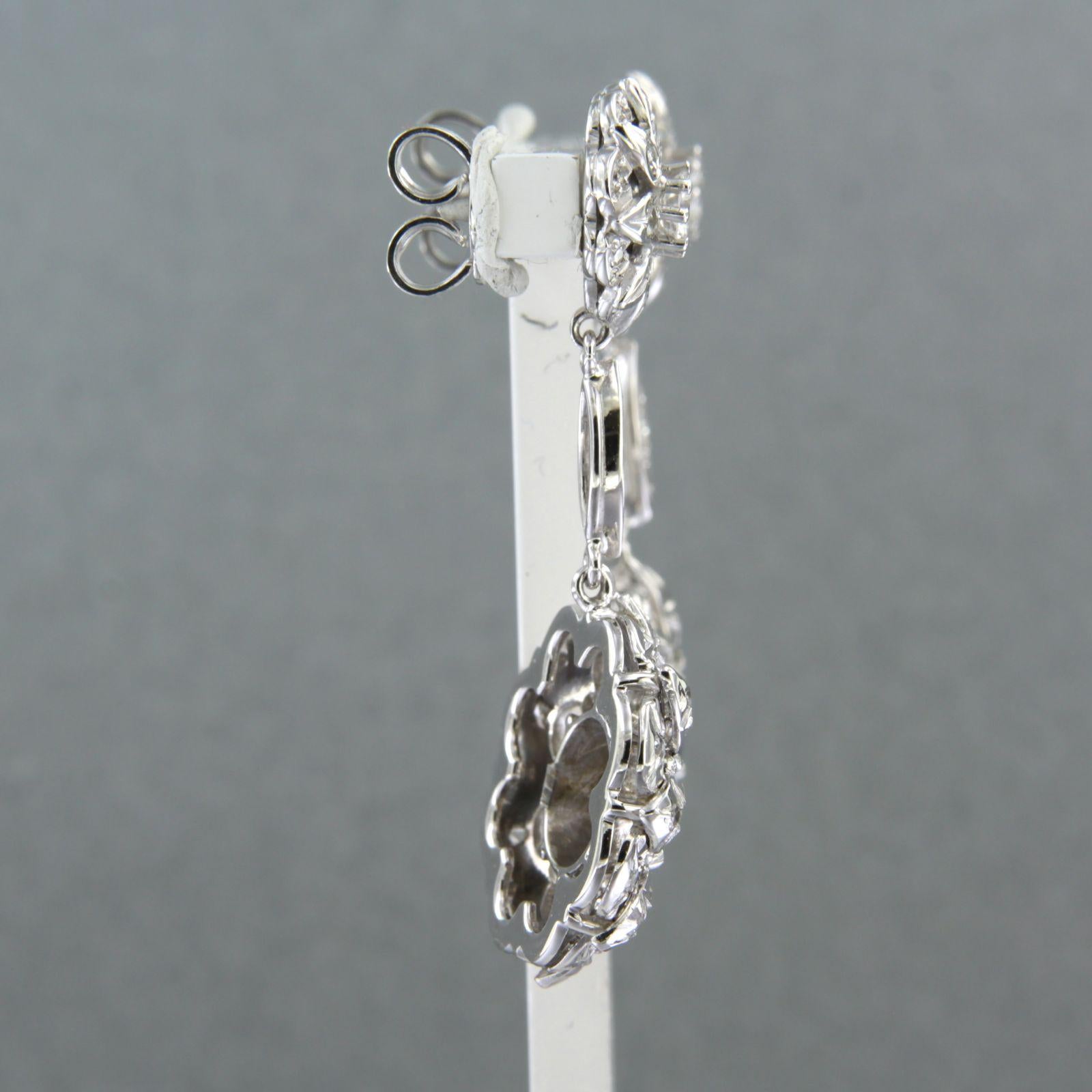 Pendientes de oro blanco de 14k engastados con zafiro y diamantes talla brillante y talla única. 1,64 ct - F/G - VS/SI 

descripción detallada

el tamaño del pendiente es de 4,0 cm de largo por 1,9 cm de ancho

peso 14,0 gramos

con

- 2 zafiros