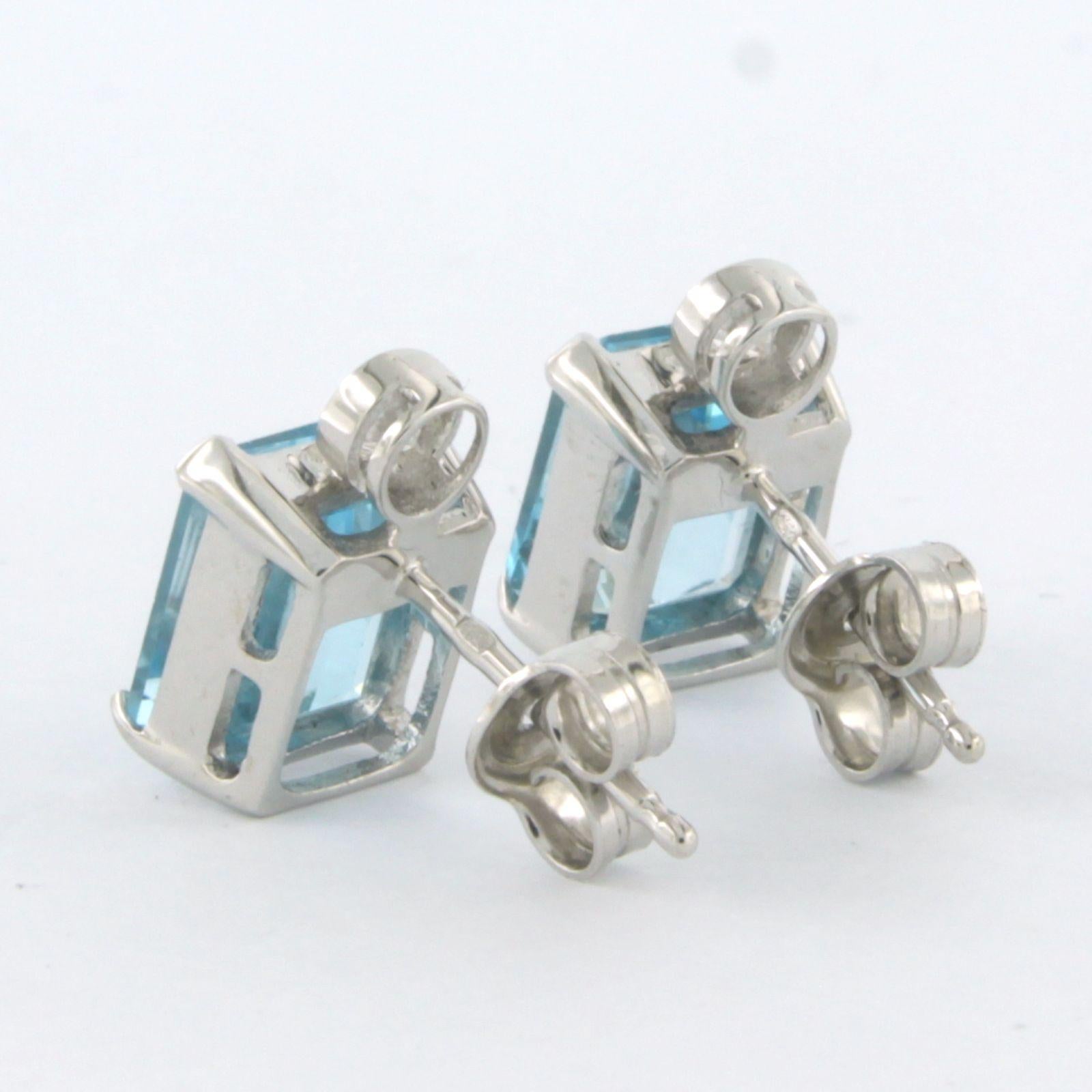 Boucles d'oreilles en or blanc 14k serties de topaze et de diamants taille brillant jusqu'à 0,20 ct - F/G - VS/SI

Description détaillée :

Les boucles d'oreilles mesurent 1,3 cm de long et 8,0 mm de large.

Poids total : 3,8 grammes

Set avec :

-