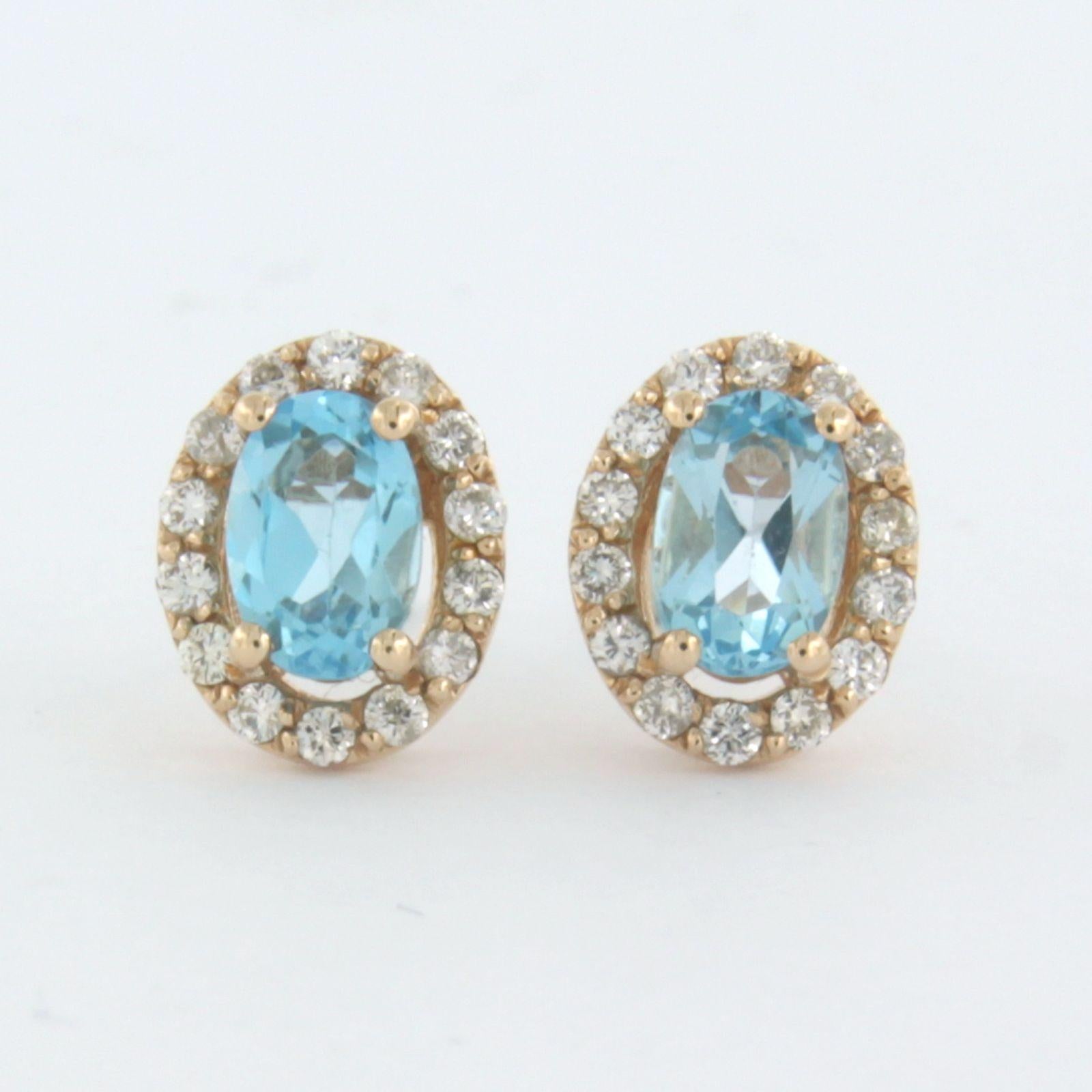 14k pink gold stud earrings with topaz and brilliant cut diamond up to 0.26ct - F/G – VS/SI 

Detailed description:

The size of the stud is 9.1 mm high by 7.3 mm wide

Total weight 1.9 grams

set with

- 2 x 6.0 mm x 4.0 mm oval facet cut topaz
