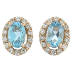 Boucles d'oreilles avec topaze et diamants taille brillant jusqu'à 0,26 ct Or rose 14k