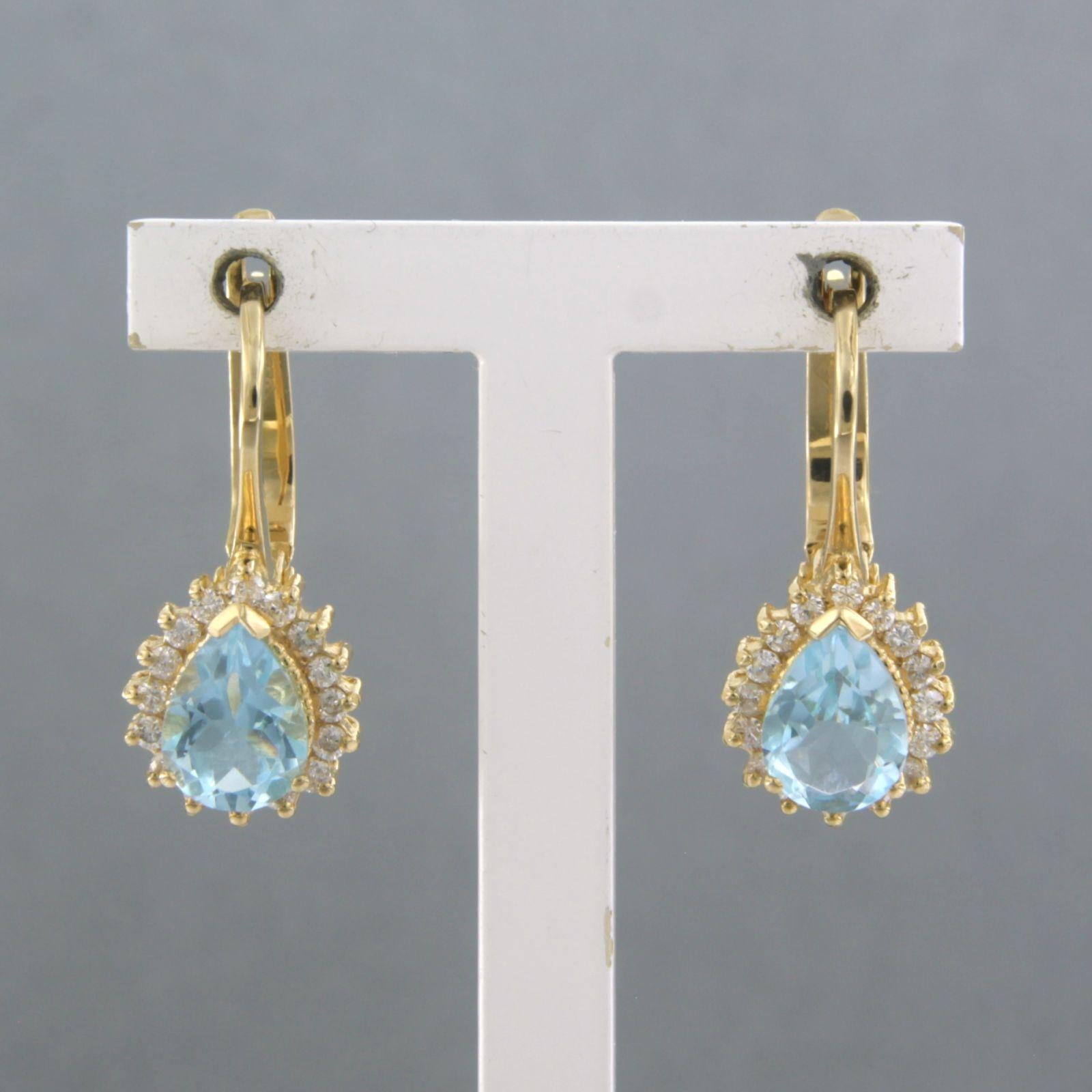 Boucles d'oreilles en or jaune 18k avec topaze et diamant taille brillant jusqu'à 0.30ct - F/G - VS/SI

Description détaillée :

La taille de la boucle d'oreille est de 1,9 cm de long par 8,5 mm de large.

Poids total 4,1 grammes

set avec

- 2 x
