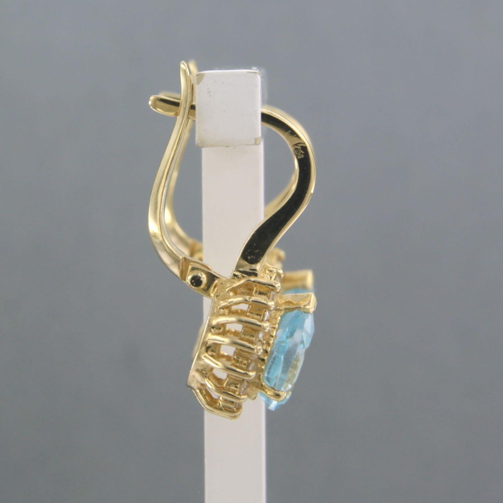 Moderne Boucles d'oreilles avec topaze et diamants taille brillant jusqu'à 0,30ct Or jaune 18k en vente