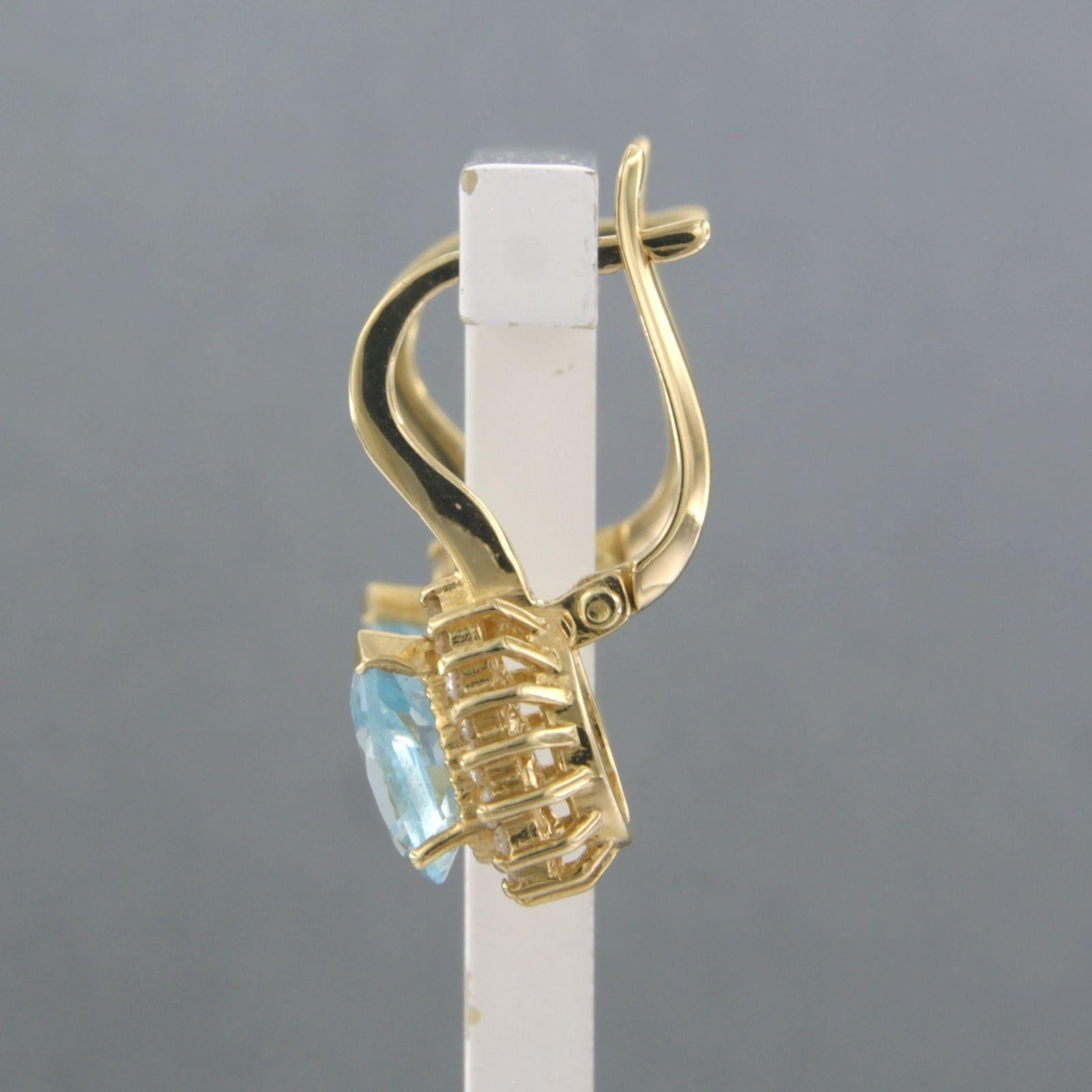 Taille brillant Boucles d'oreilles avec topaze et diamants taille brillant jusqu'à 0,30ct Or jaune 18k en vente